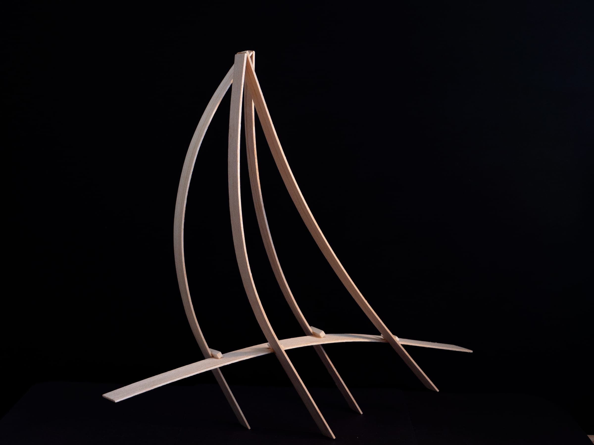 Study model of bent steamed wood, curved strips meeting at a point